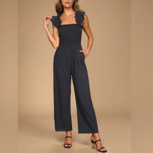 Lulu's eyelet jumpsuit with a ruffle sleeves - Picture 1 of 5